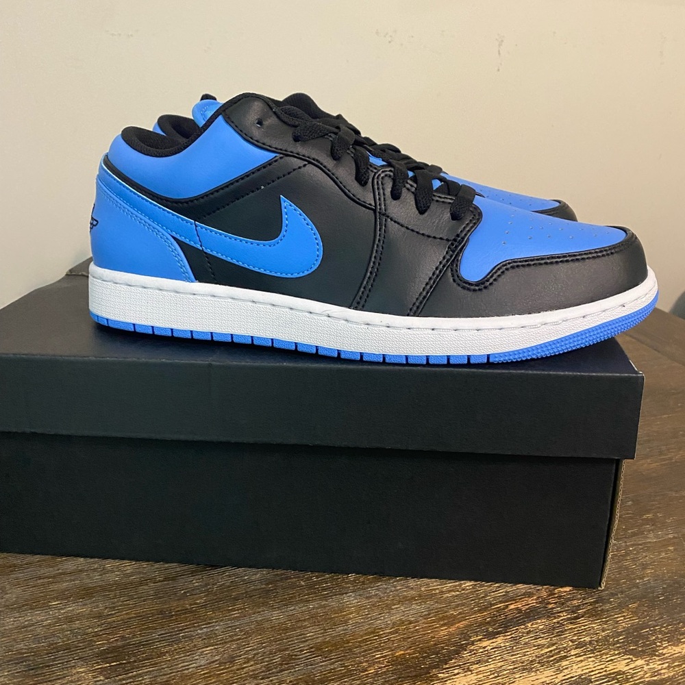 Brand New Jordan 1 Low size 11 black and university blue!